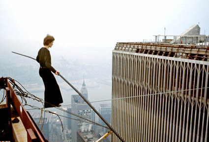 Philippe Petit on high wire across New York's twin towers